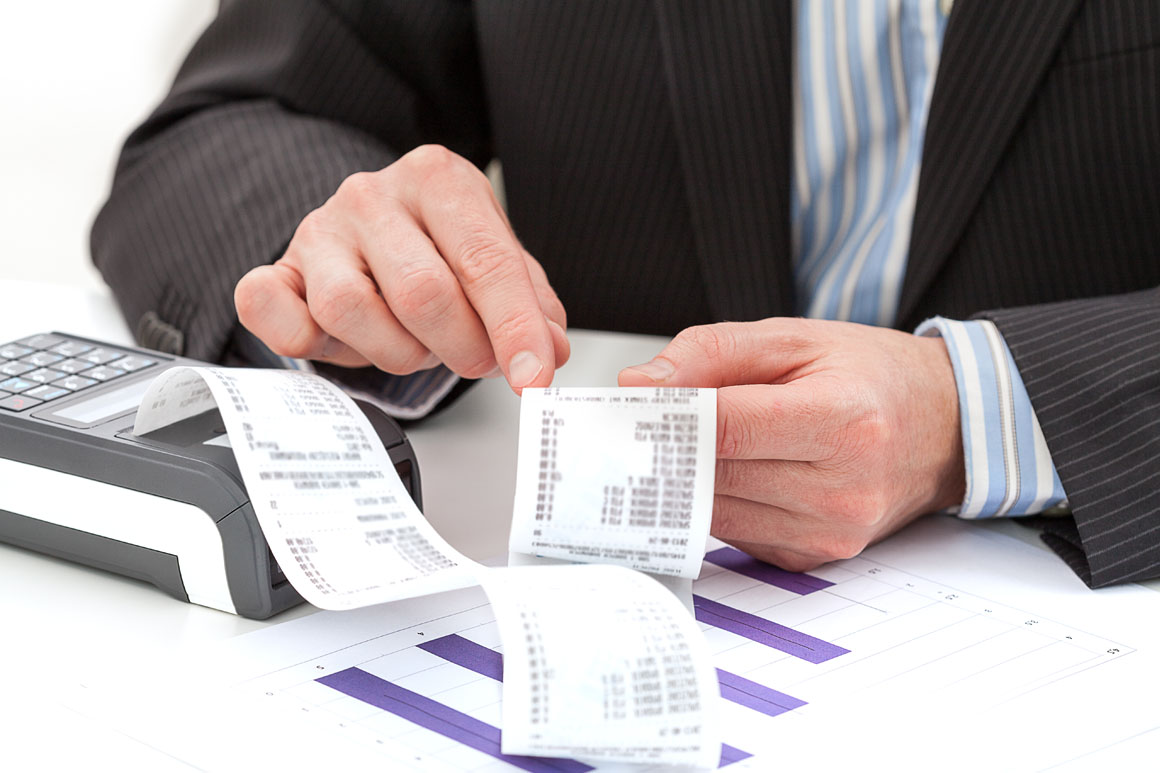 Person looking at receipts