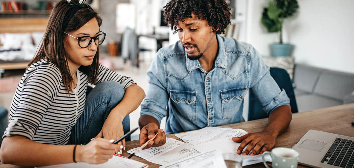 Woman and man budgeting together