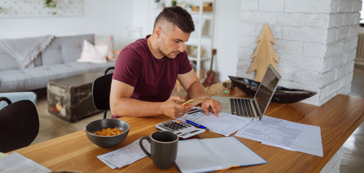 Man figuring out his finances