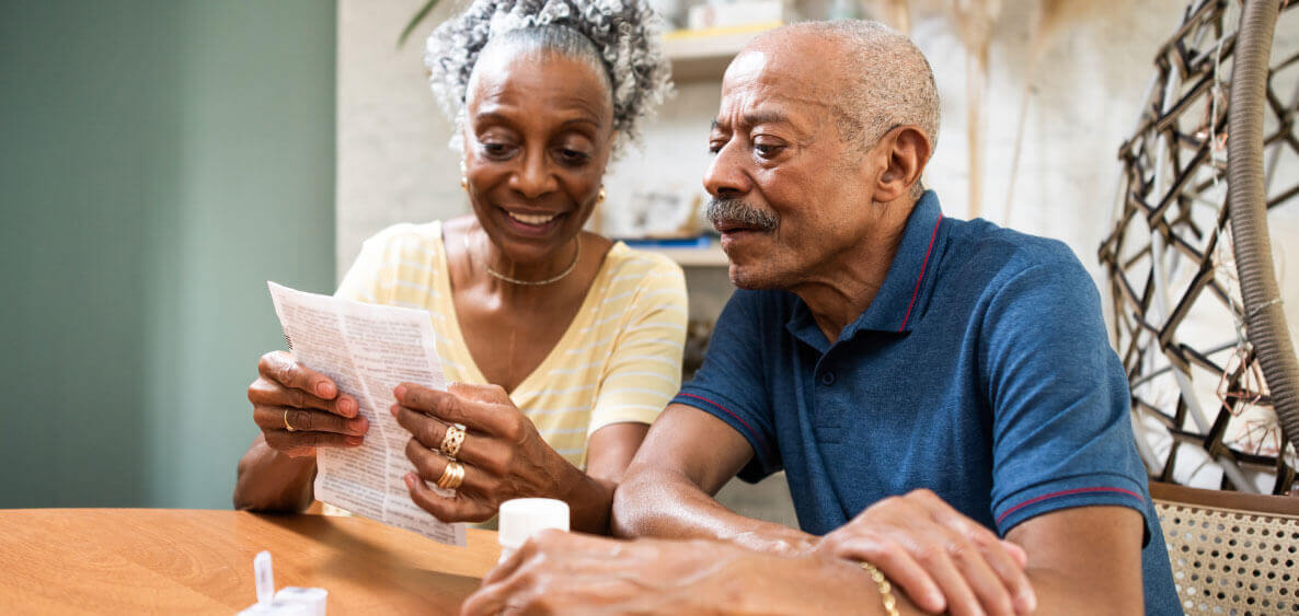 Senior couple looking at their statement