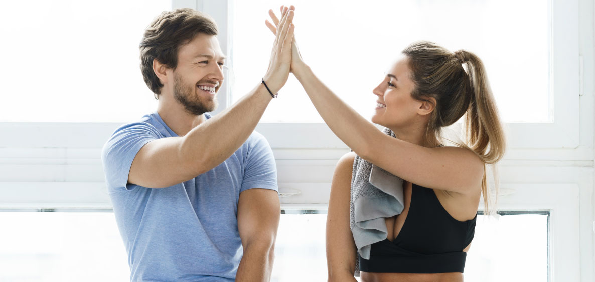 Couple giving each other a high five