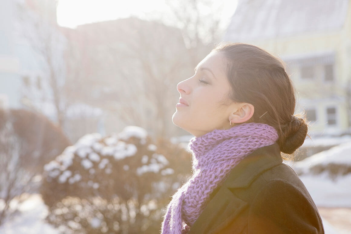 Woman outside in the code coping with the holidays