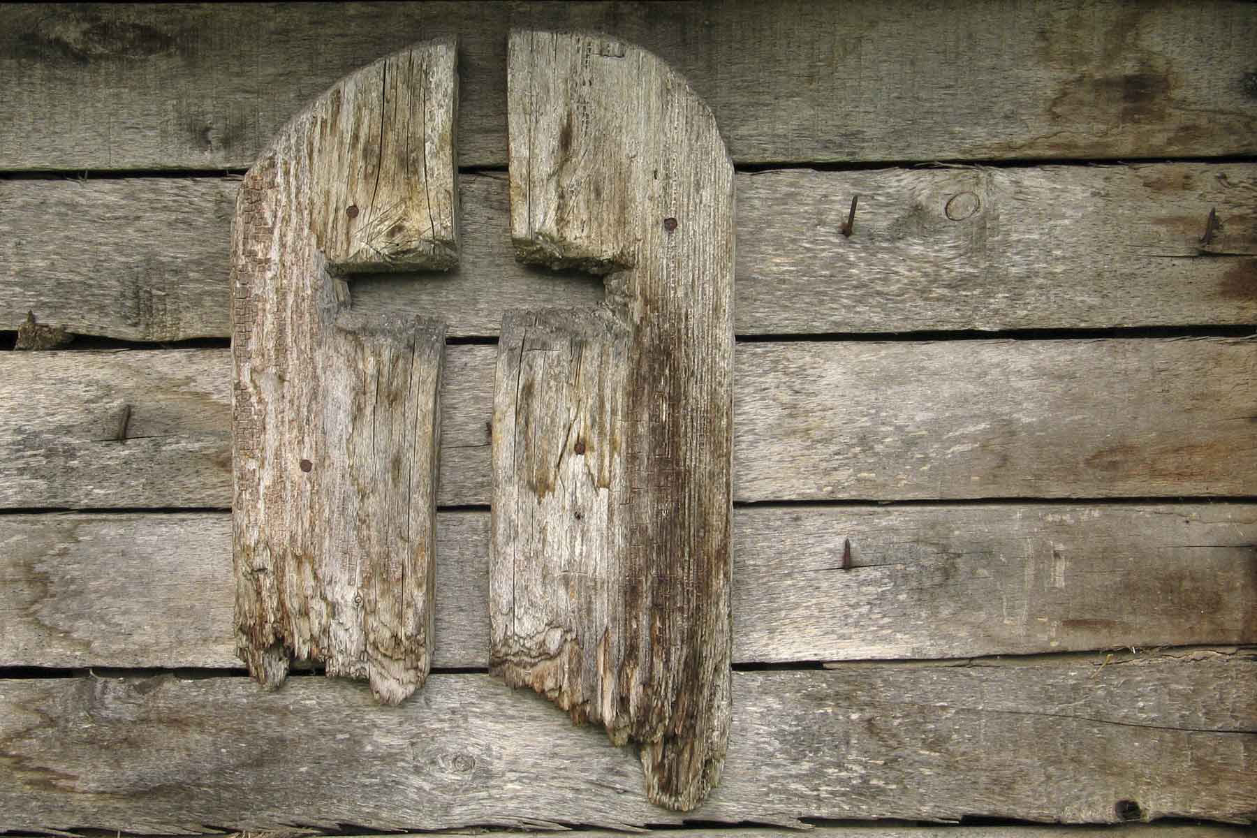 Cross carved into wood