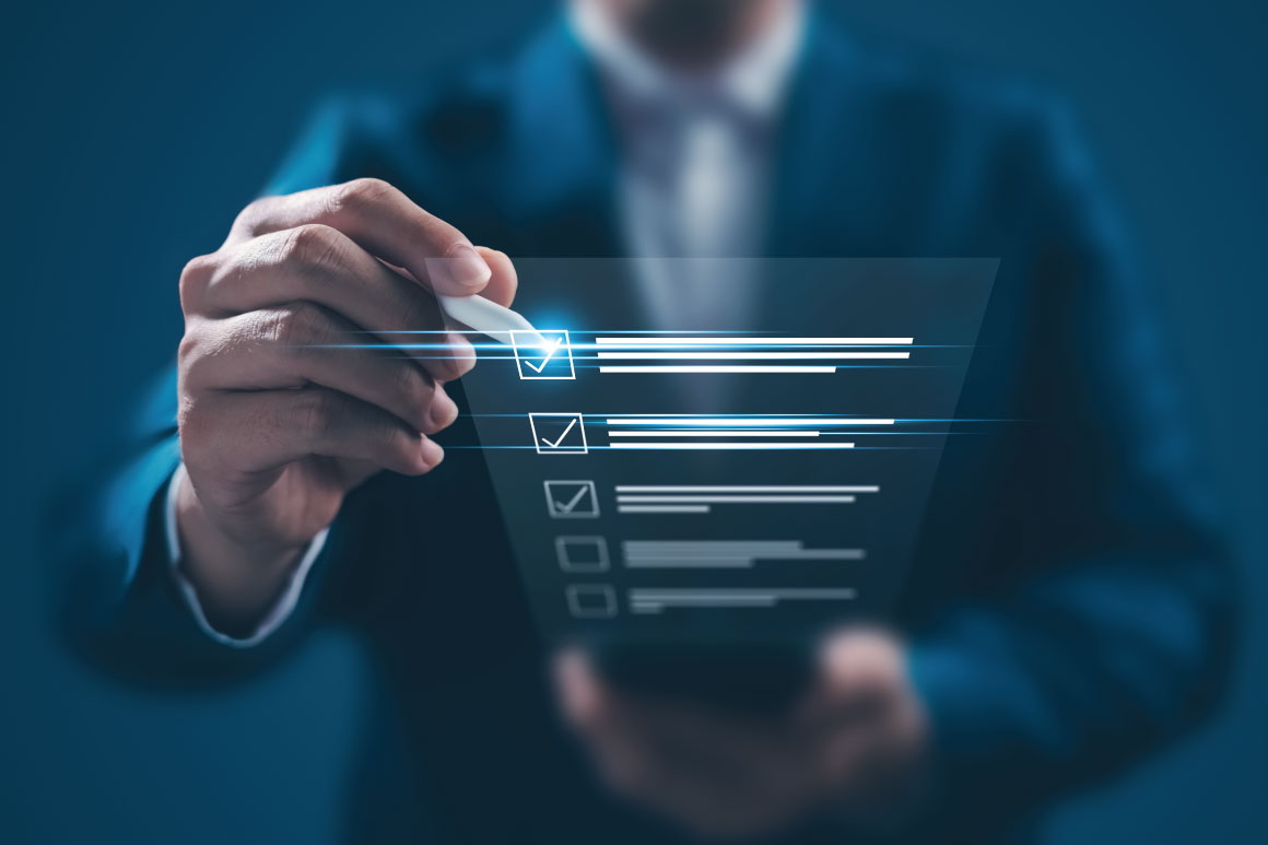Man with digital checklist