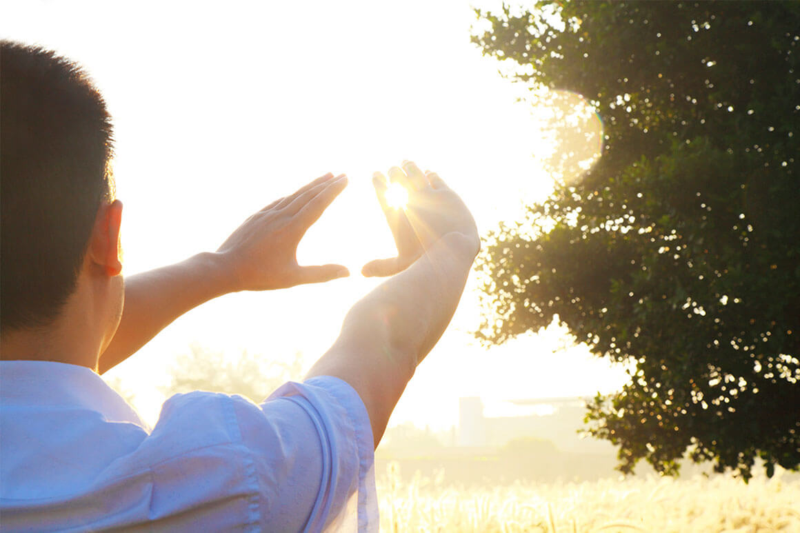 Hand and sun