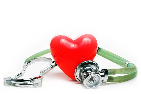 Stethoscope over plastic heart