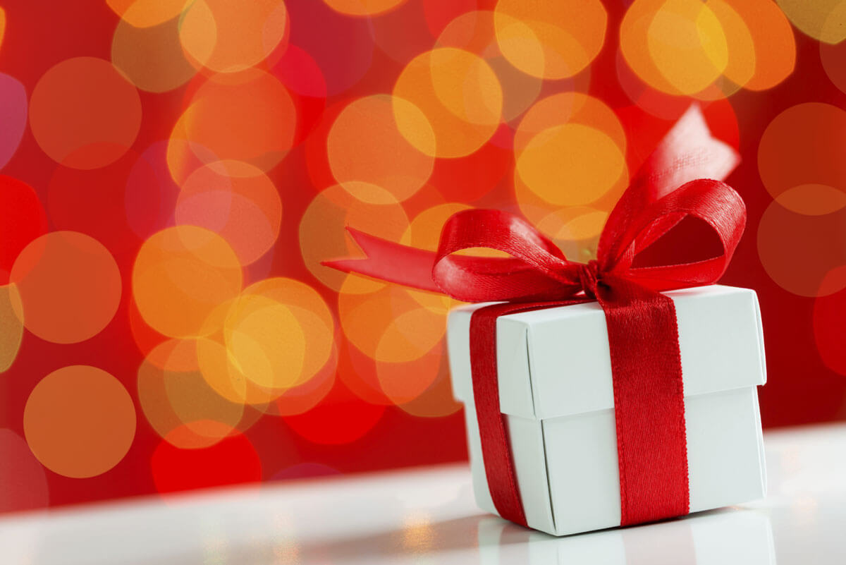 Holiday giftbox with red ribbon