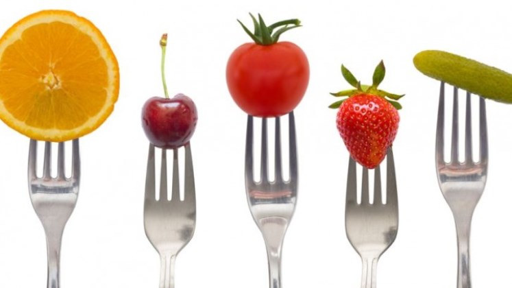 Forks with fruits on it