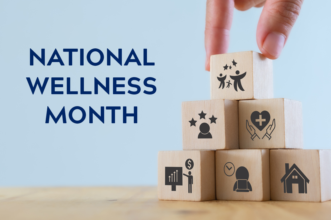 National Wellness Month with block cubes with icons on them stacked in a pyramid.