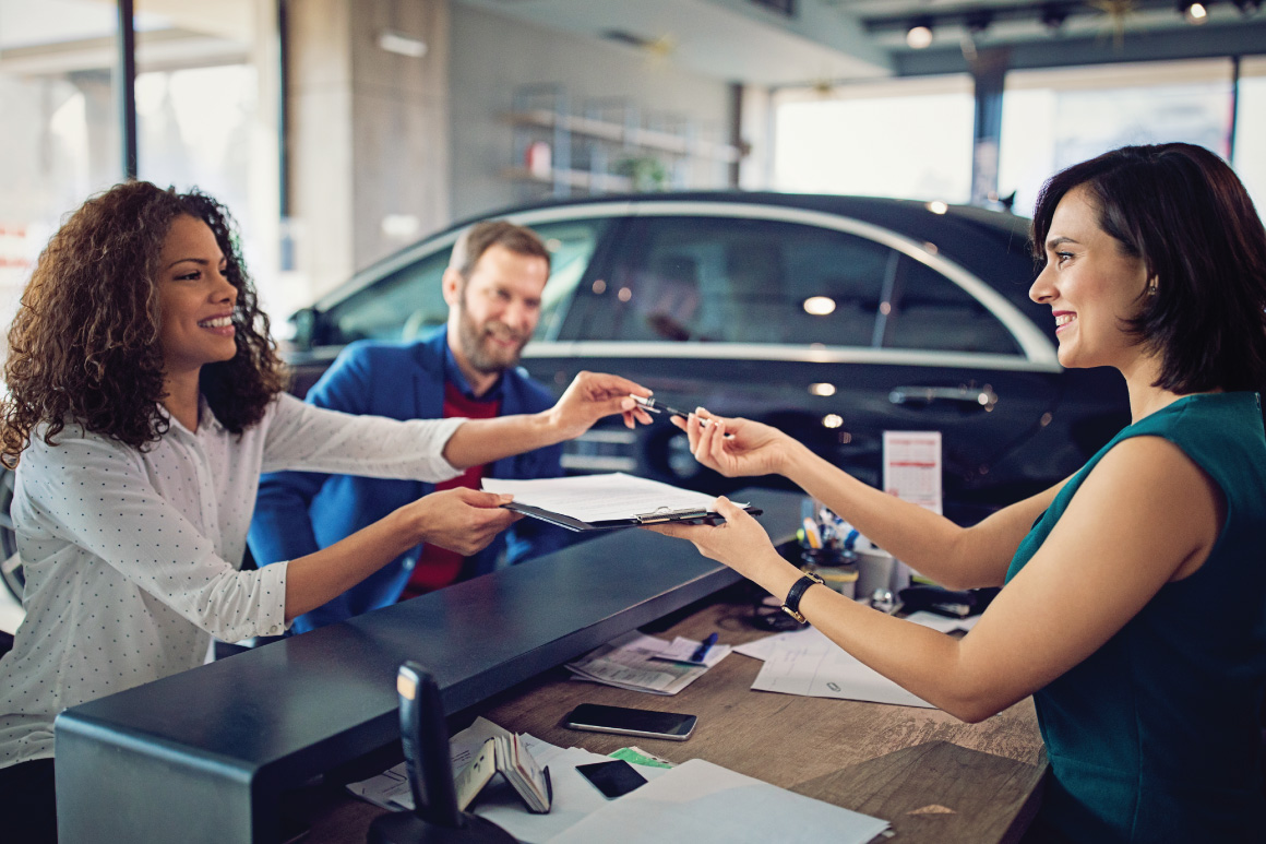 People at car dealership
