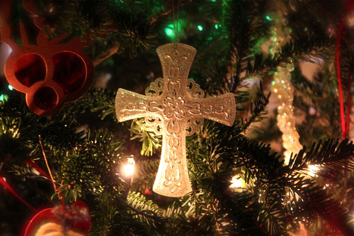 Christmas tree with cross ornament 