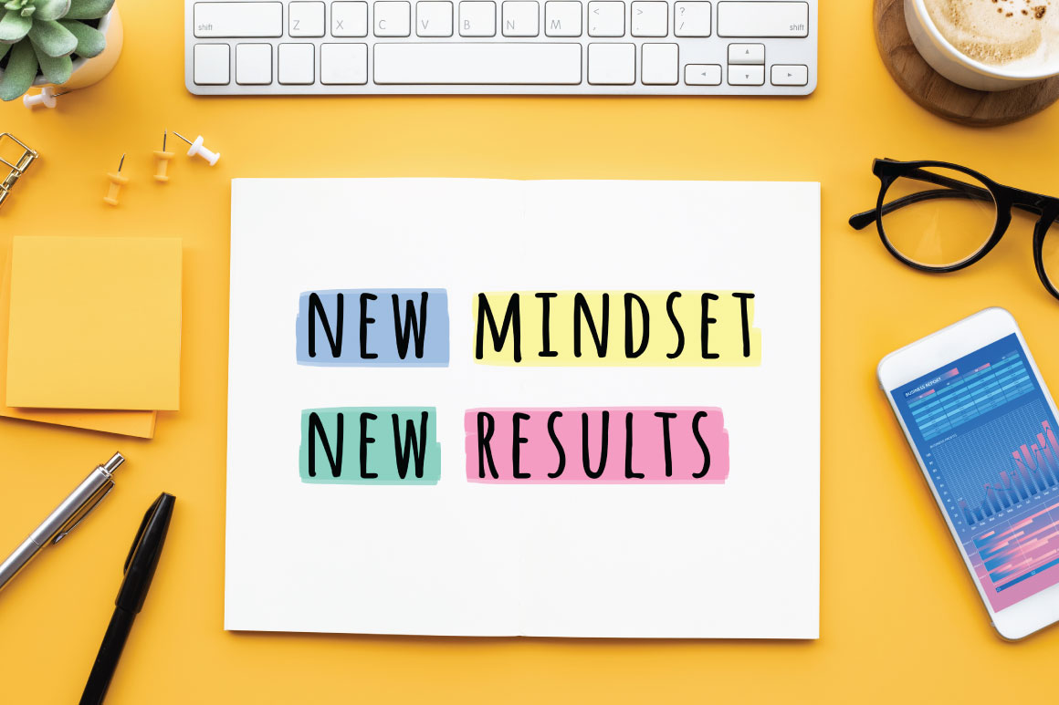 Sheet of paper on a desk with the words New Mindset New Results