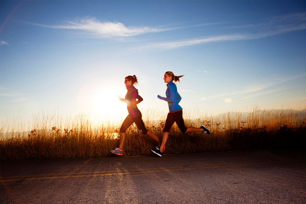 Two women running